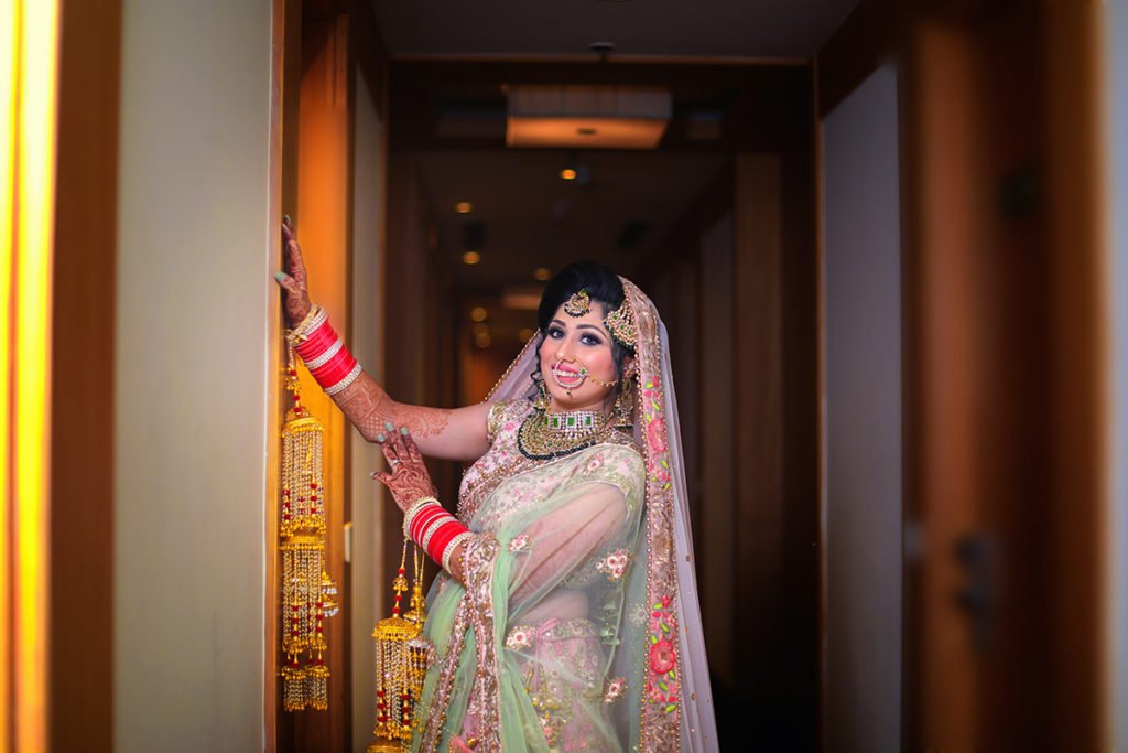 Indian Bride Pose With Golden Kaleere